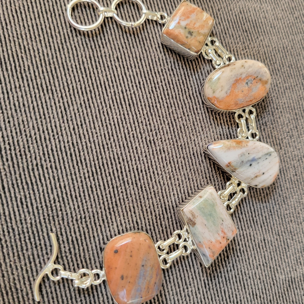 Elegant Silver and Orange Stone Bracelet